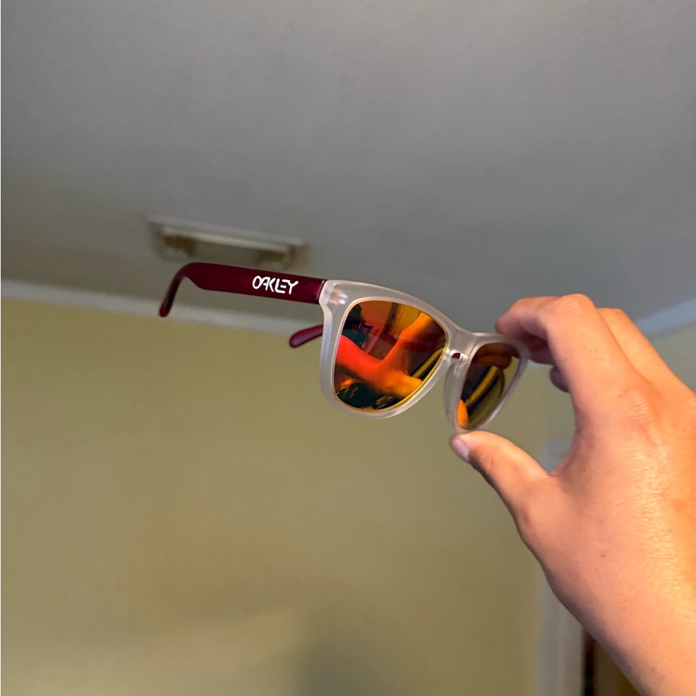 Oakley Sunglasses with Clear Frames and Red Temples, Orange Mirrored Oakley